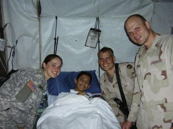 Tammy visiting soldier in field hospital